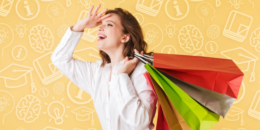 Happy woman holding shopping bags
