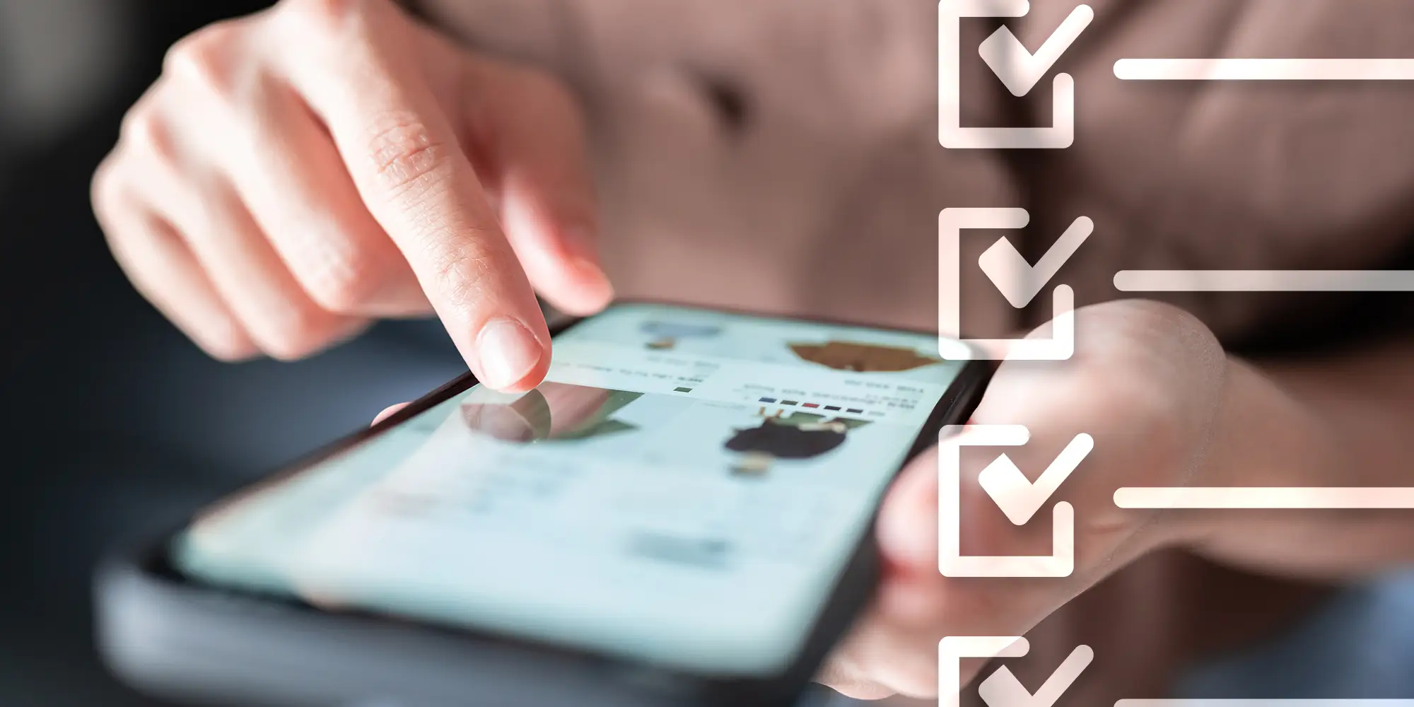 Hand scrolling on mobile phone reviewing a website