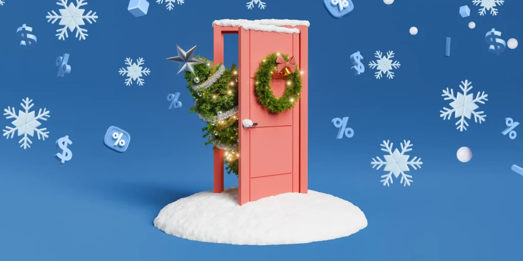 festive door with Christmas tree peeking out