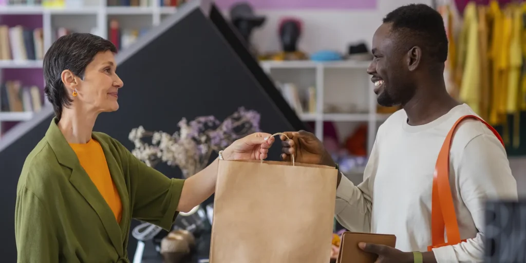 customer and retailer at checkout