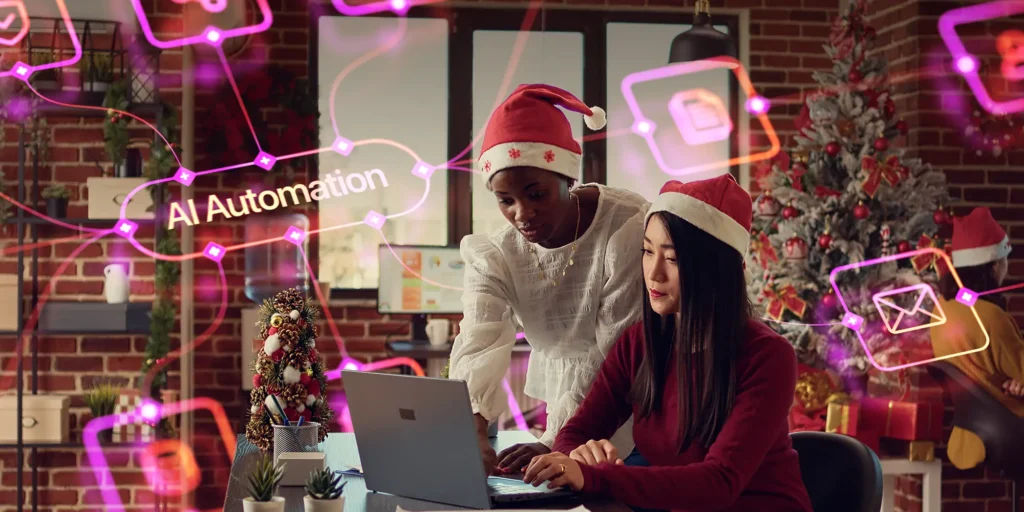 two women working at a computer to set up holiday marketing automations
