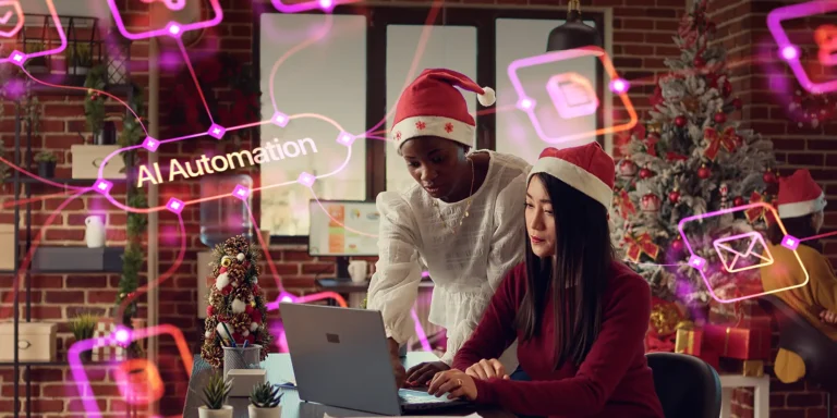 two women working at a computer to set up holiday marketing automations