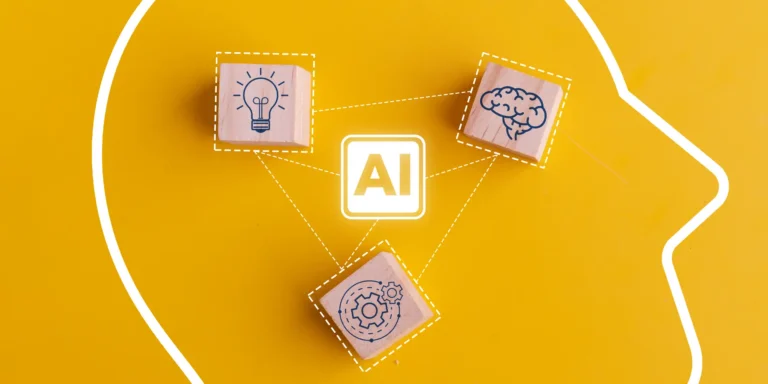 wooden blocks and AI inside a human head outline to represent how to be creative in an AI-first world