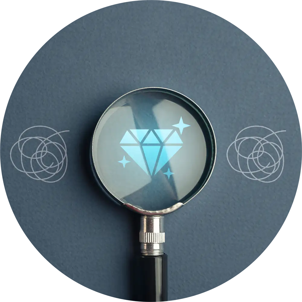 graphic image of magnifying glass held over a diamond symbol