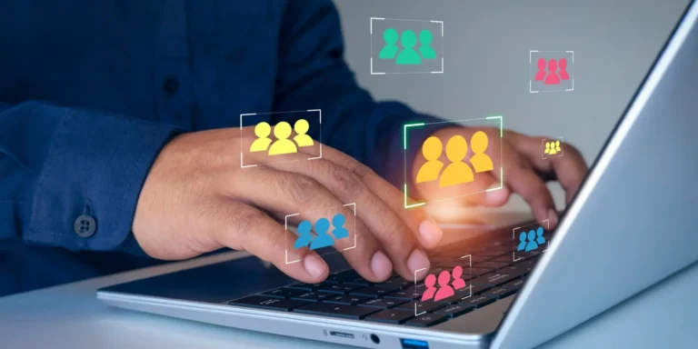 stock image of hands typing on keyboard, several colored icons symbolizing personalization floating mid-air