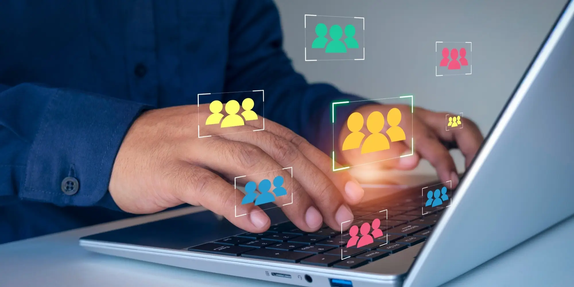 stock image of hands typing on keyboard, several colored icons symbolizing personalization floating mid-air